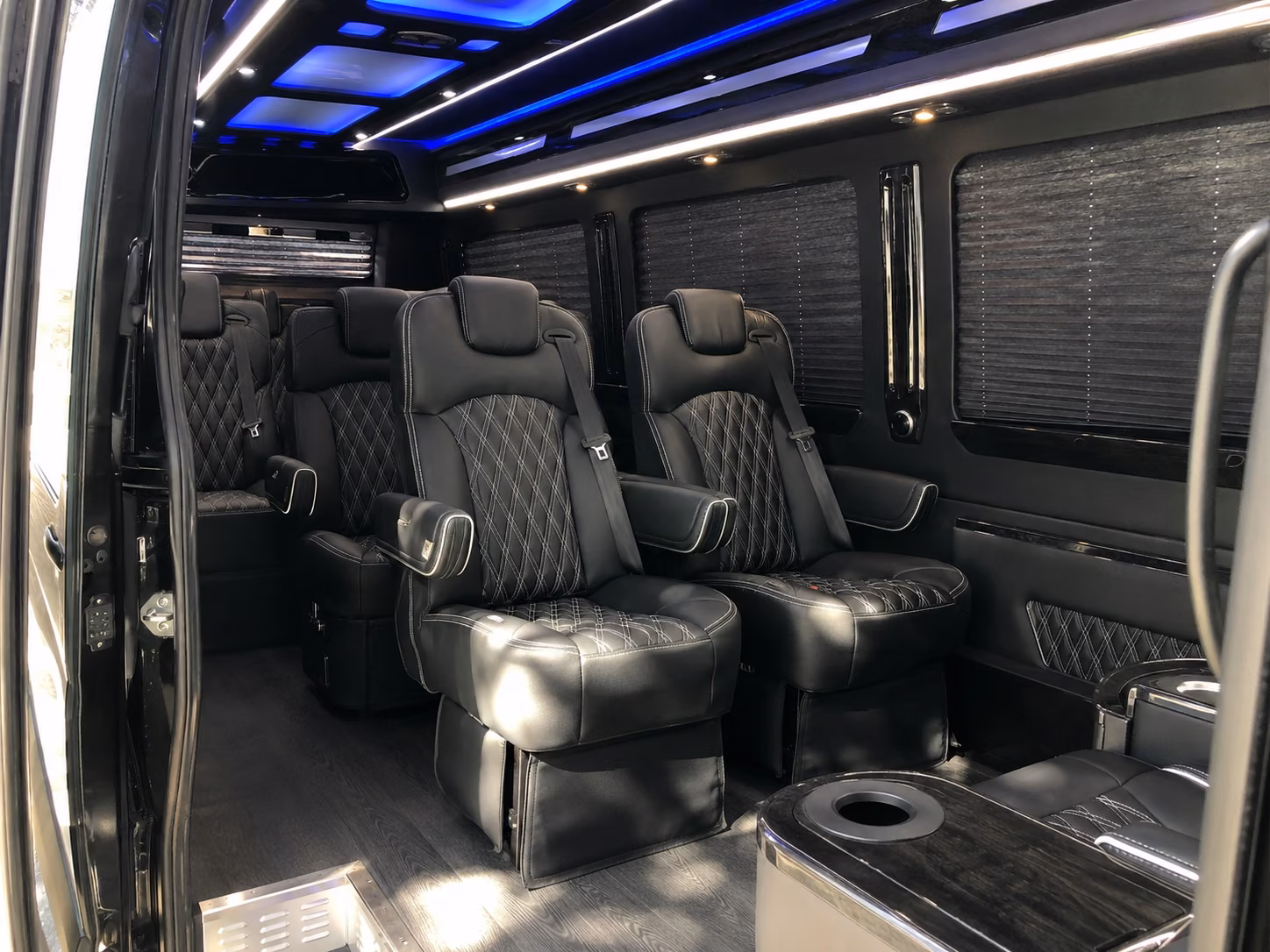 carrollton sprinter van with driver inside